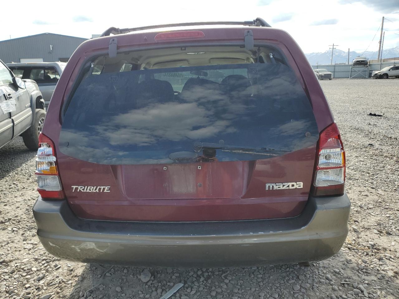 2004 Mazda Tribute Lx VIN: 4F2YZ94184KM33916 Lot: 70839734