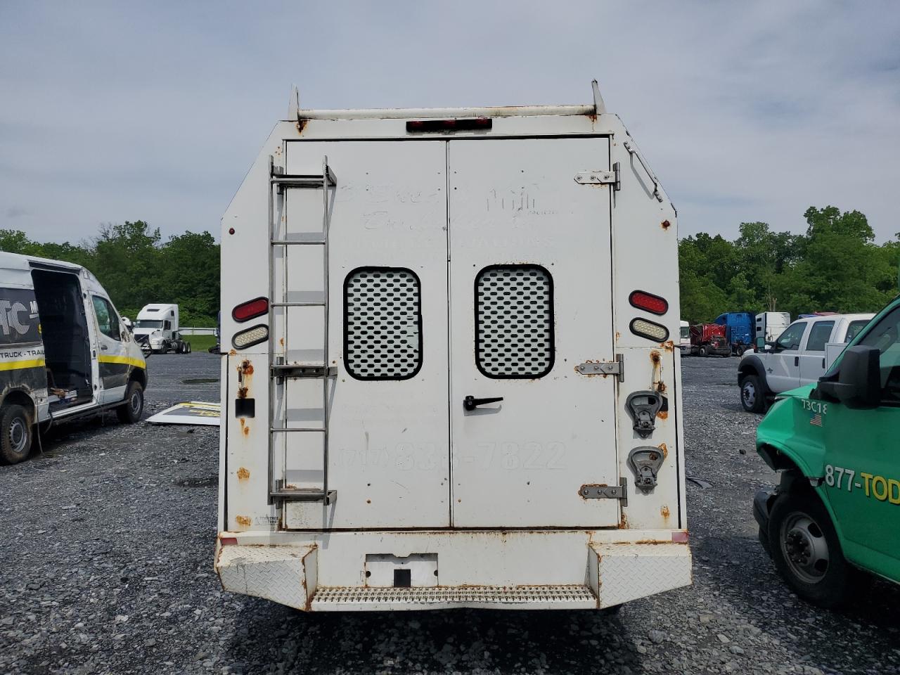 2009 Ford Econoline E350 Super Duty Cutaway Van VIN: 1FDSE35L39DA88834 Lot: 64048354