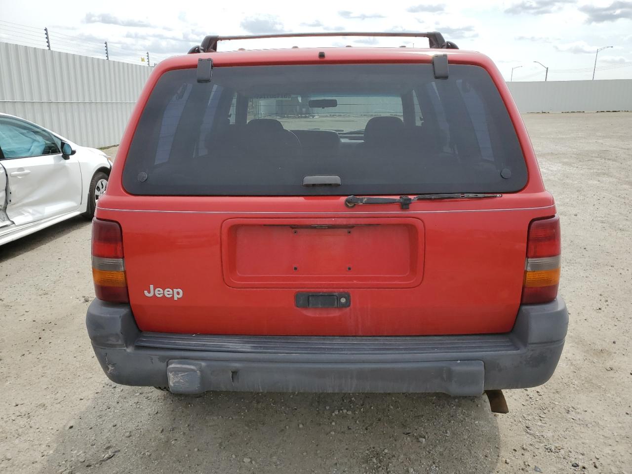1996 Jeep Grand Cherokee Laredo VIN: 1J4GZ58S6TC221400 Lot: 57130174