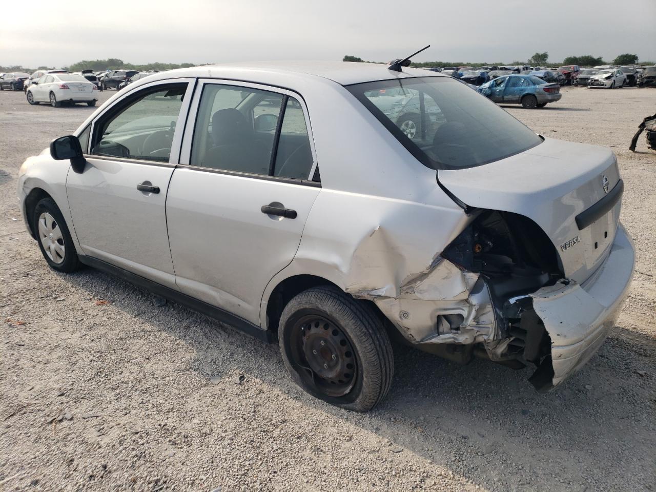 2009 Nissan Versa S VIN: 3N1CC11E49L422411 Lot: 54321654