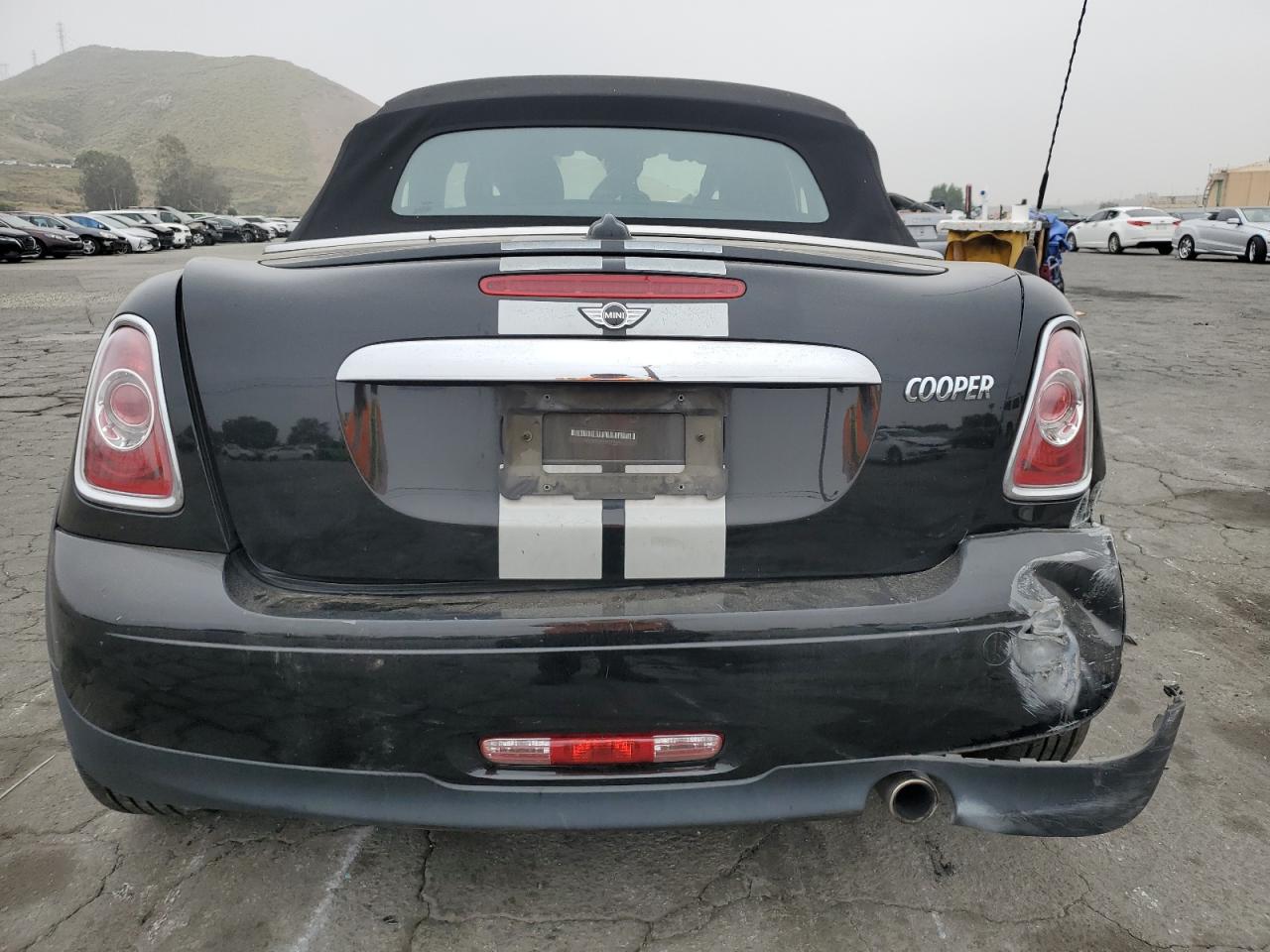 2015 Mini Cooper Roadster VIN: WMWSY1C51FT719678 Lot: 56009604