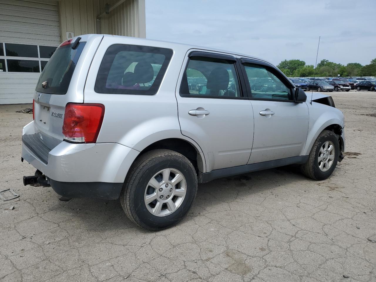 2010 Mazda Tribute I VIN: 4F2CY0C74AKM05590 Lot: 55279104