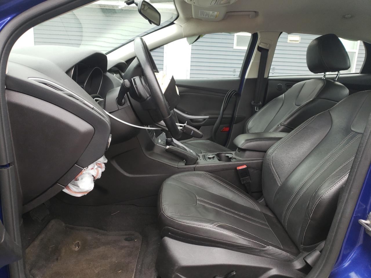 2014 Ford Focus Titanium VIN: 1FADP3J23EL291295 Lot: 55395894