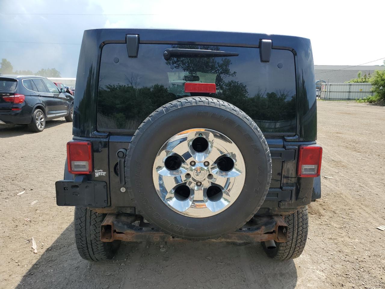 2015 Jeep Wrangler Unlimited Sahara VIN: 1C4BJWEG7FL594527 Lot: 53383074