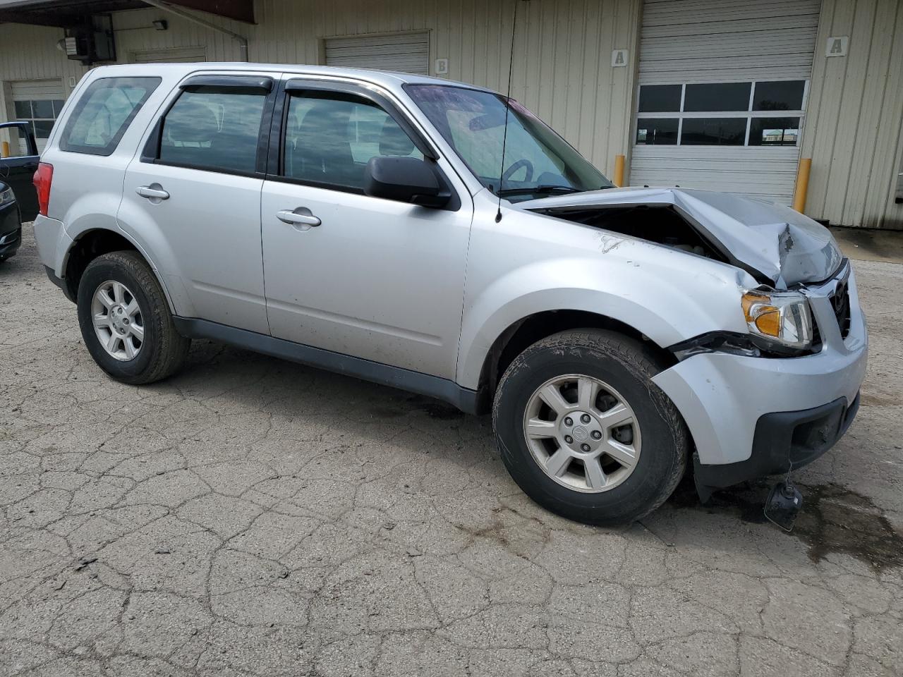 2010 Mazda Tribute I VIN: 4F2CY0C74AKM05590 Lot: 55279104