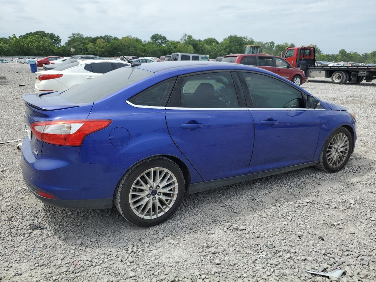 2014 Ford Focus Titanium VIN: 1FADP3J29EL233790 Lot: 56396144