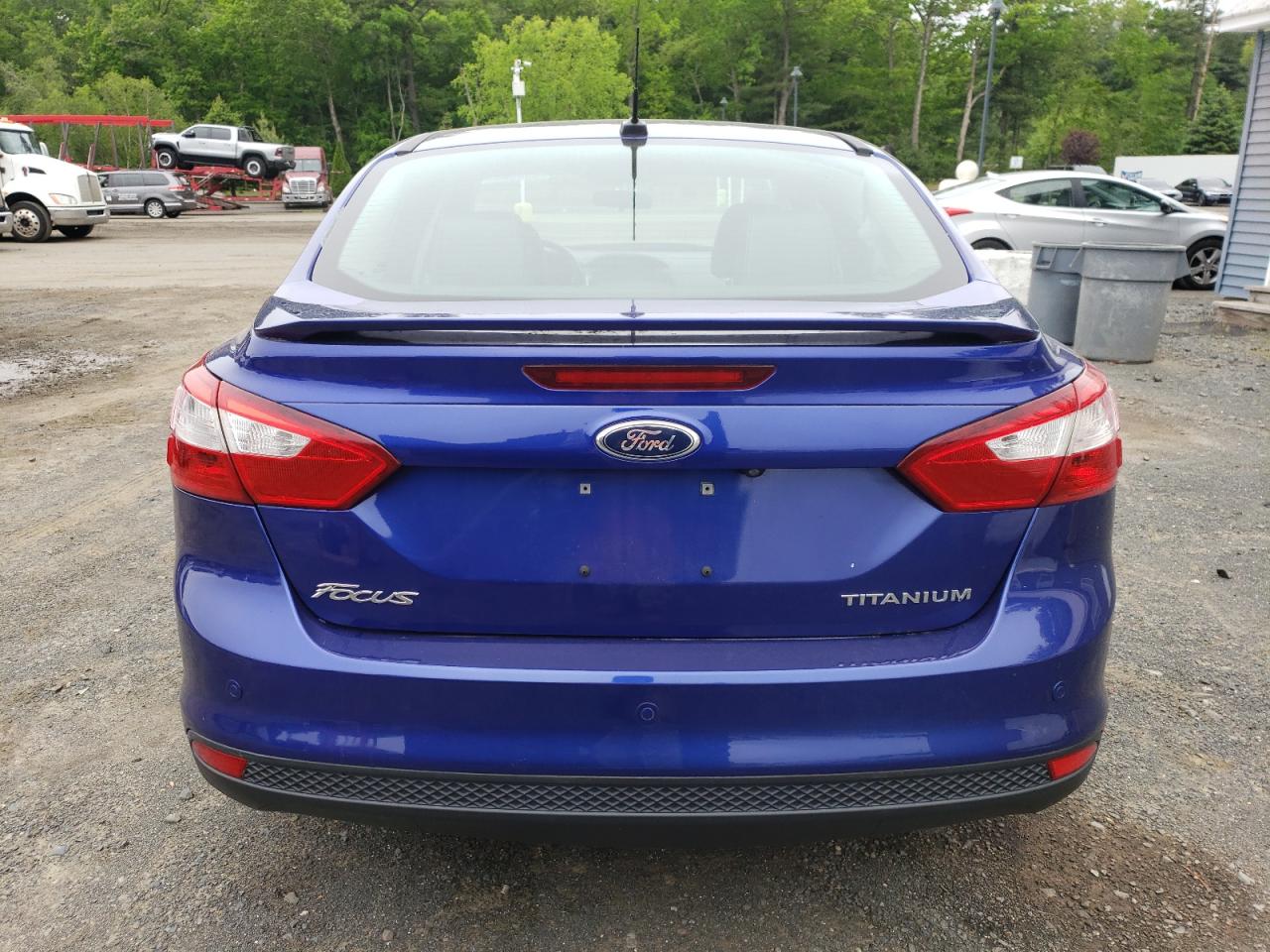 2014 Ford Focus Titanium VIN: 1FADP3J23EL291295 Lot: 55395894