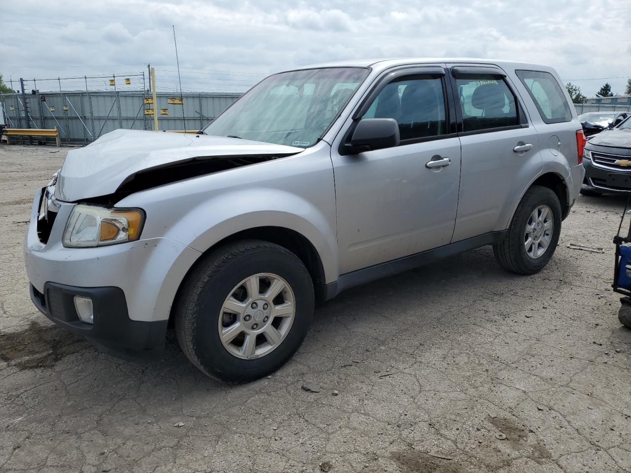 2010 Mazda Tribute I VIN: 4F2CY0C74AKM05590 Lot: 55279104