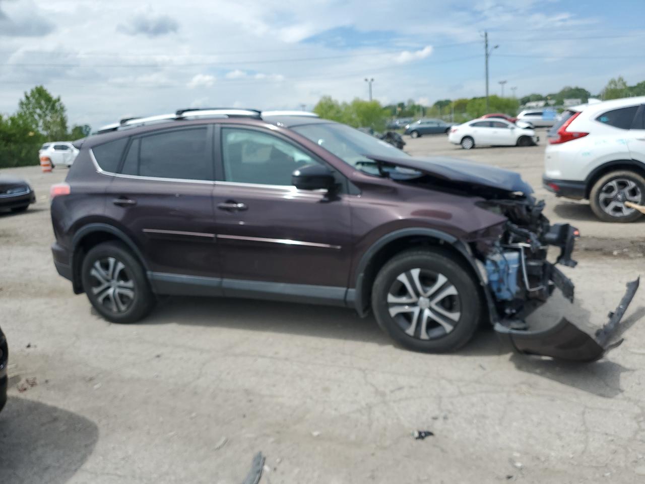 VIN 2T3BFREV7GW457054 2016 TOYOTA RAV4 no.4