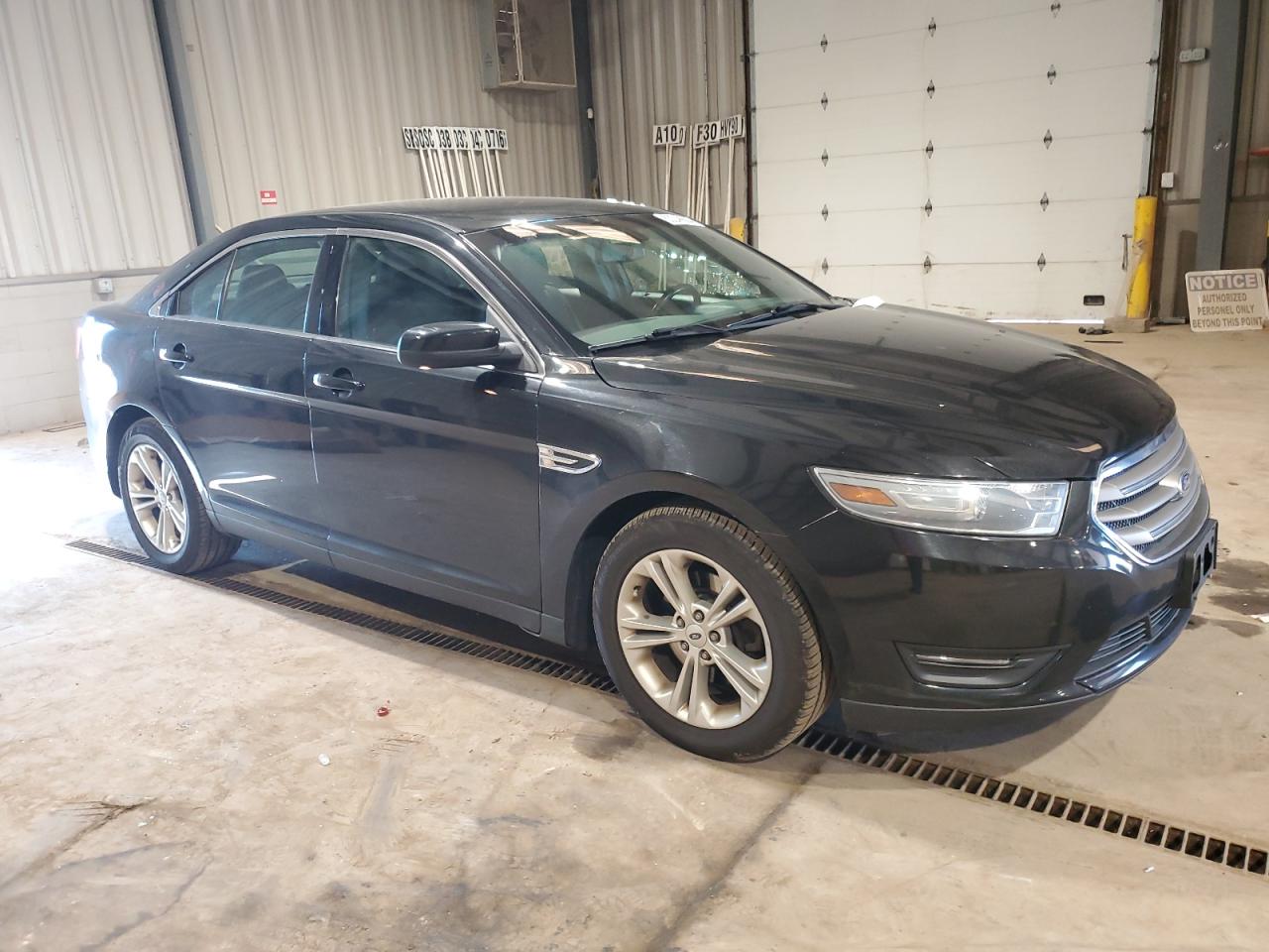 VIN 1FAHP2E80EG108325 2014 FORD TAURUS no.4