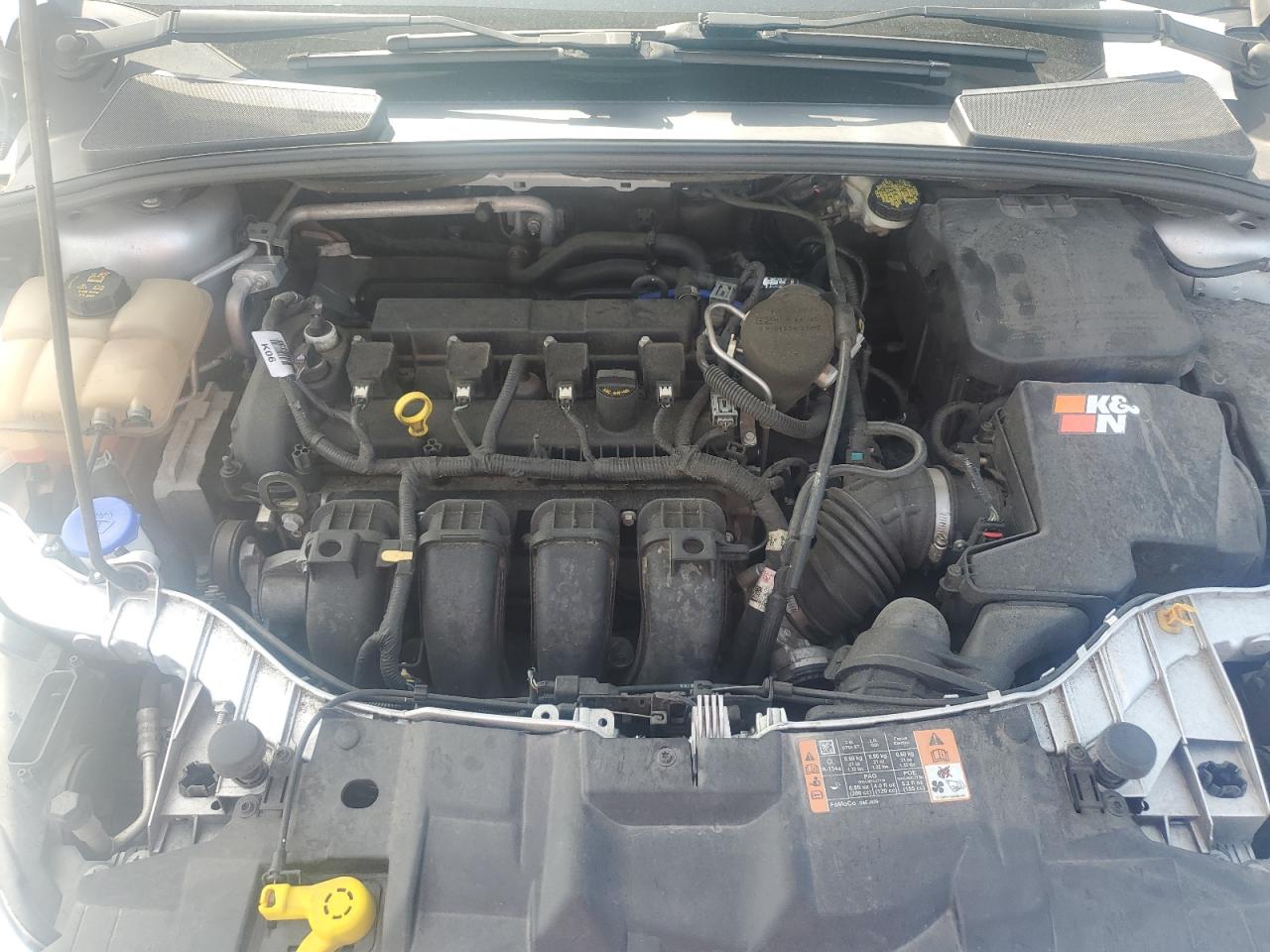 2015 Ford Focus Titanium VIN: 1FADP3J22FL323879 Lot: 56252274