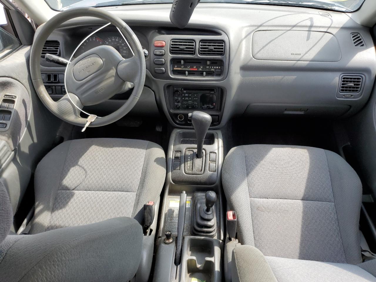 1999 Chevrolet Tracker VIN: 2CNBJ13CXX6923049 Lot: 51635354