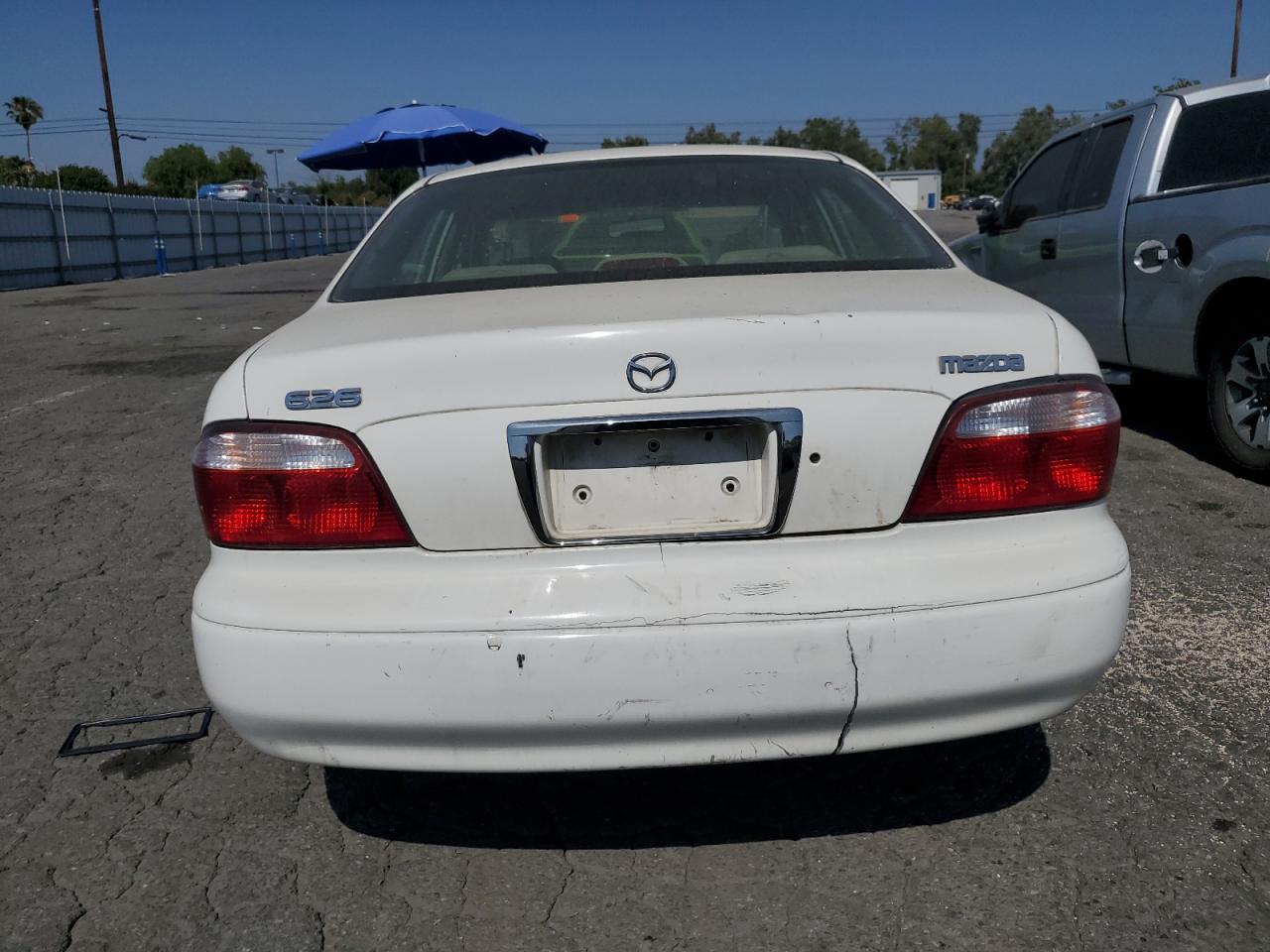 2002 Mazda 626 Lx VIN: 1YVGF22C225279581 Lot: 57244794