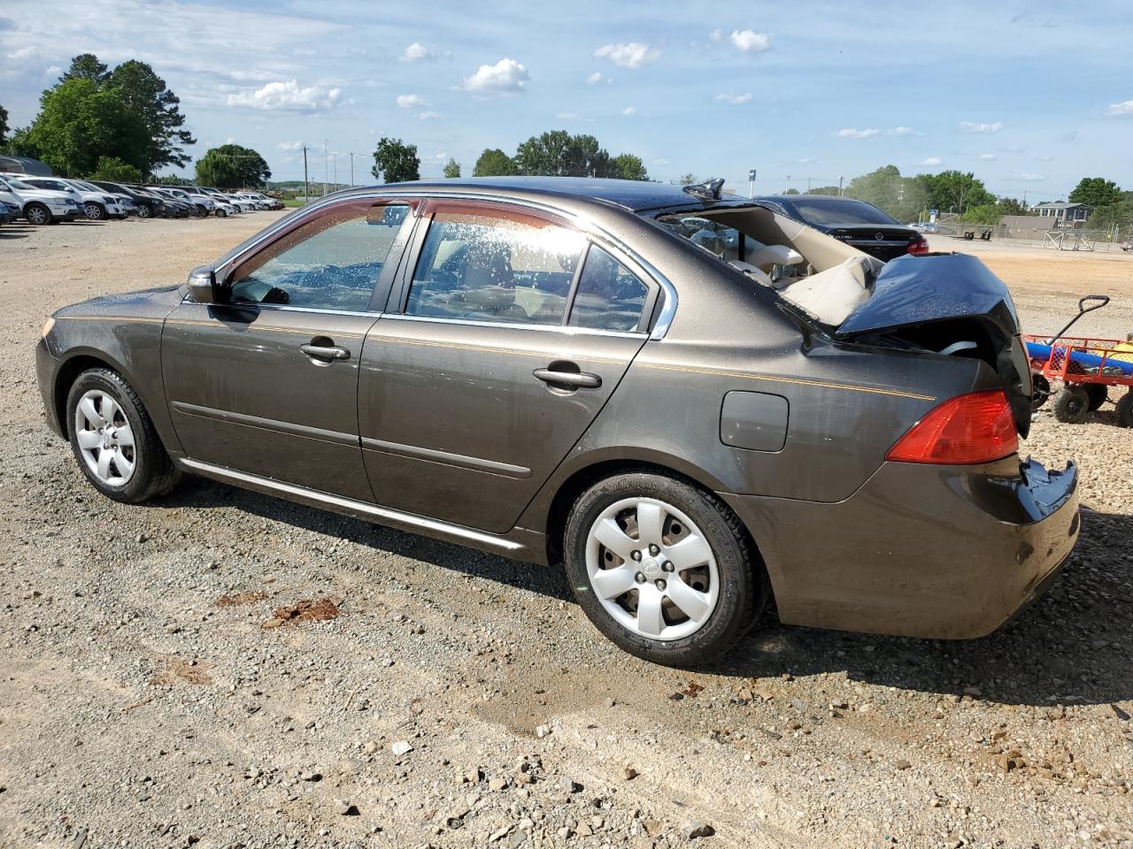 2009 Kia Optima Lx VIN: KNAGE228395314852 Lot: 55684034