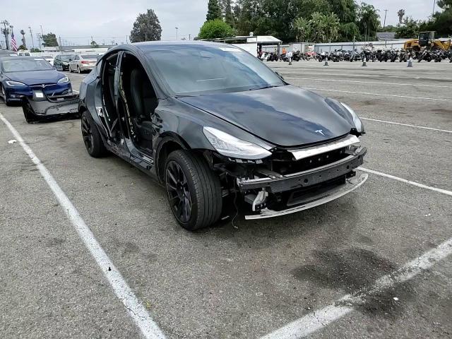 2023 Tesla Model Y VIN: 7SAYGDEE7PA035639 Lot: 54504934