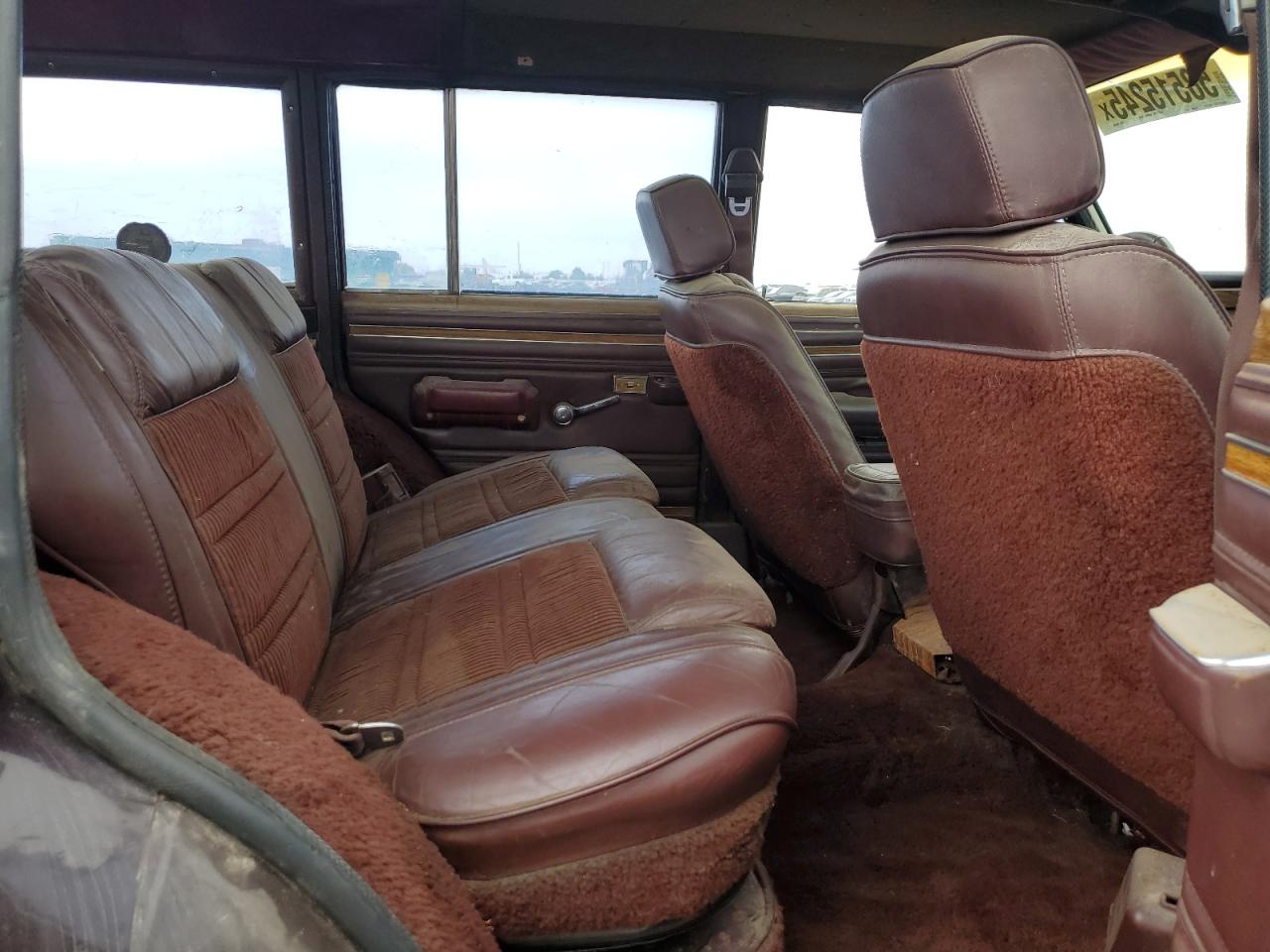 1989 Jeep Grand Wagoneer VIN: 1J4GS5872KP100998 Lot: 58515245