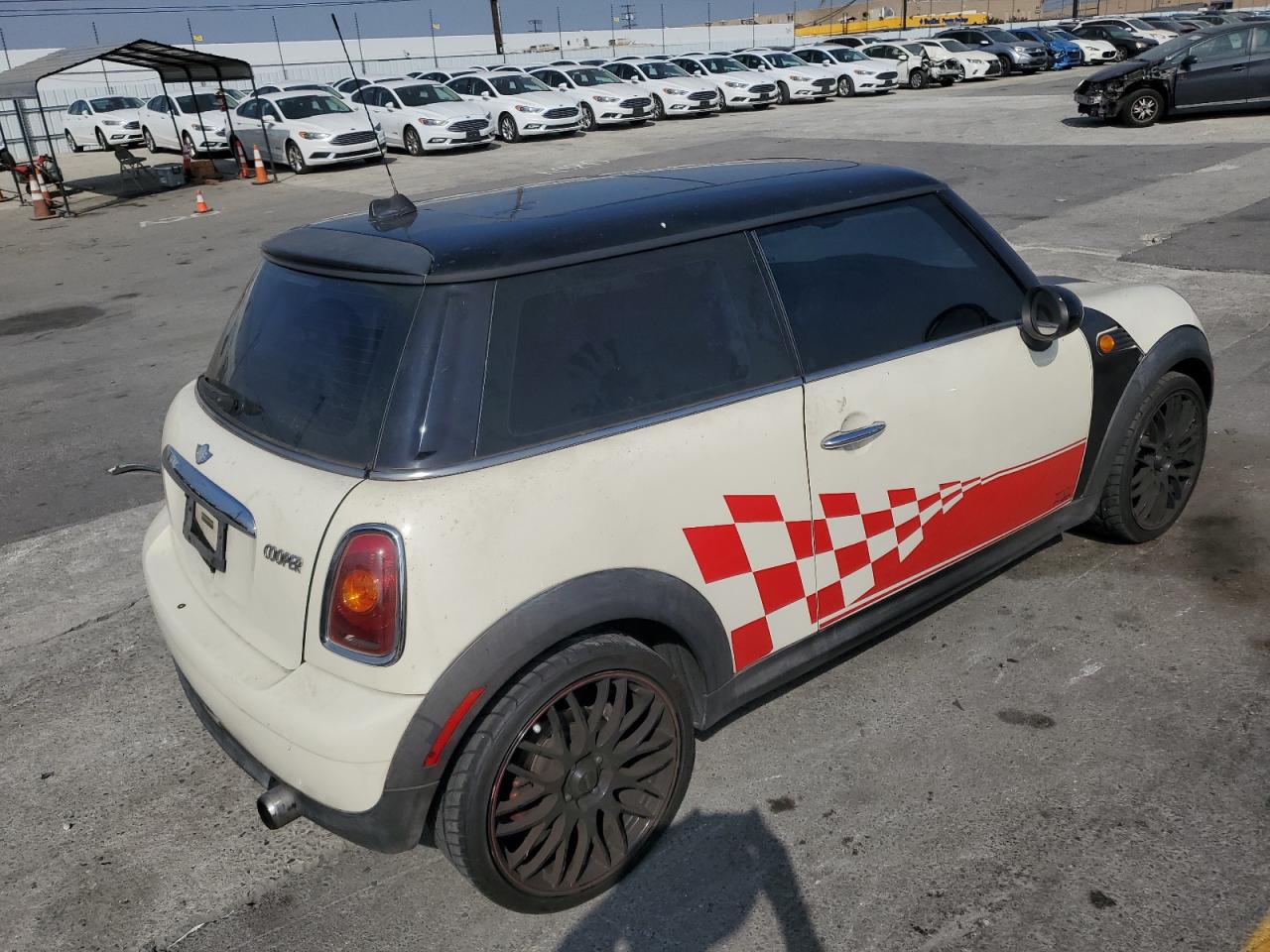 2007 Mini Cooper VIN: WMWMF33547TT51590 Lot: 57323995