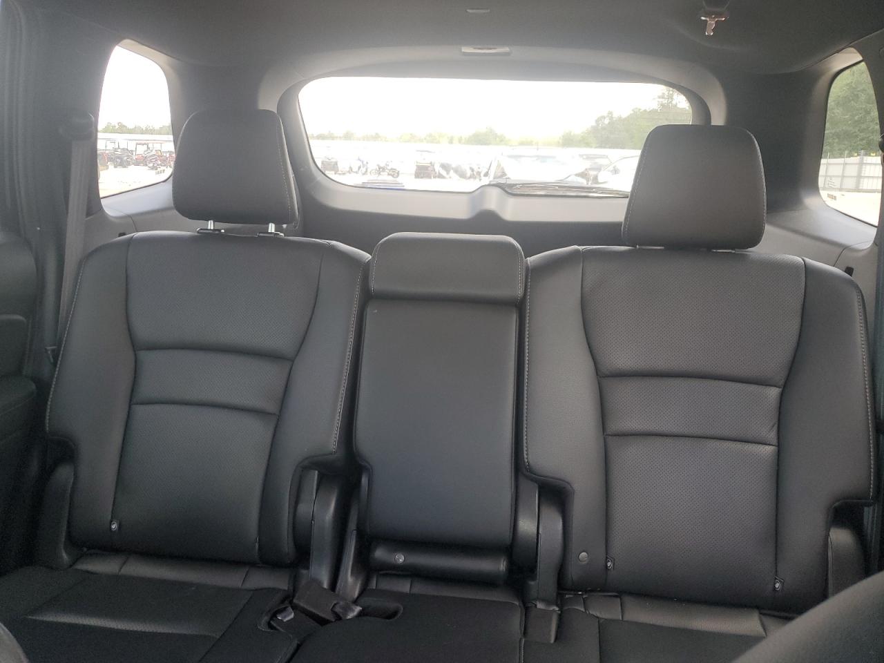 2023 Honda Passport Exl VIN: 5FNYF8H52PB032413 Lot: 55748205