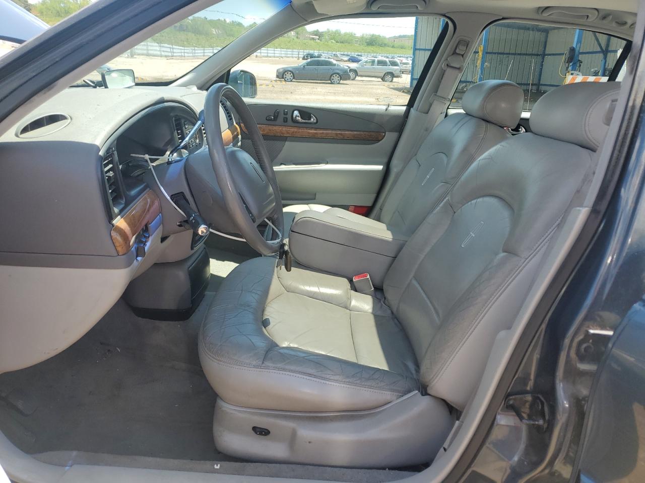 1998 Lincoln Continental VIN: 1LNFM97V2WY714576 Lot: 56664605