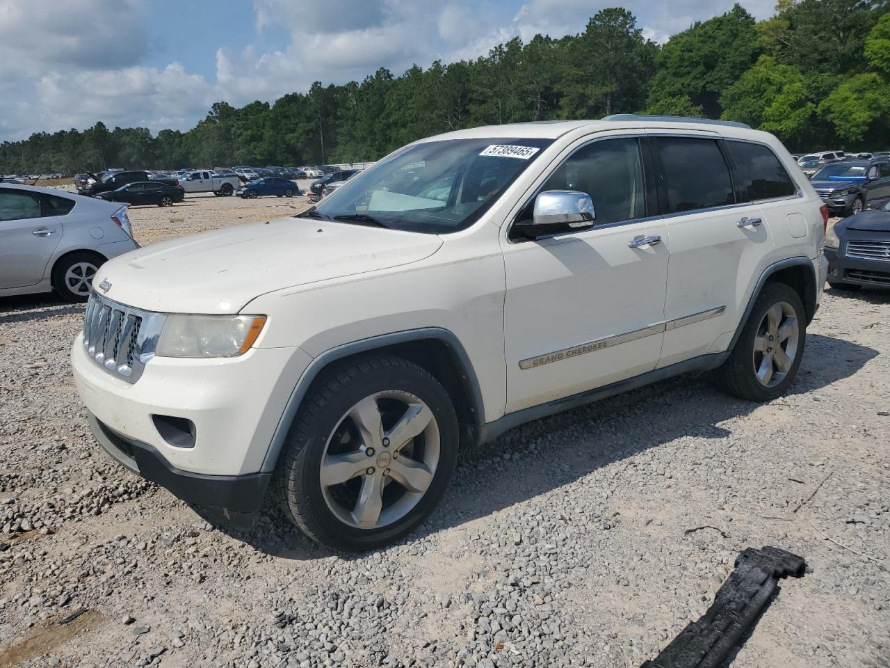 2011 Jeep Grand Cherokee Overland na sprzedaż w Eight Mile, AL - Side