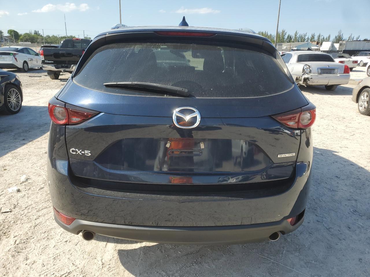2020 Mazda Cx-5 Touring VIN: JM3KFACM3L0849952 Lot: 57012845