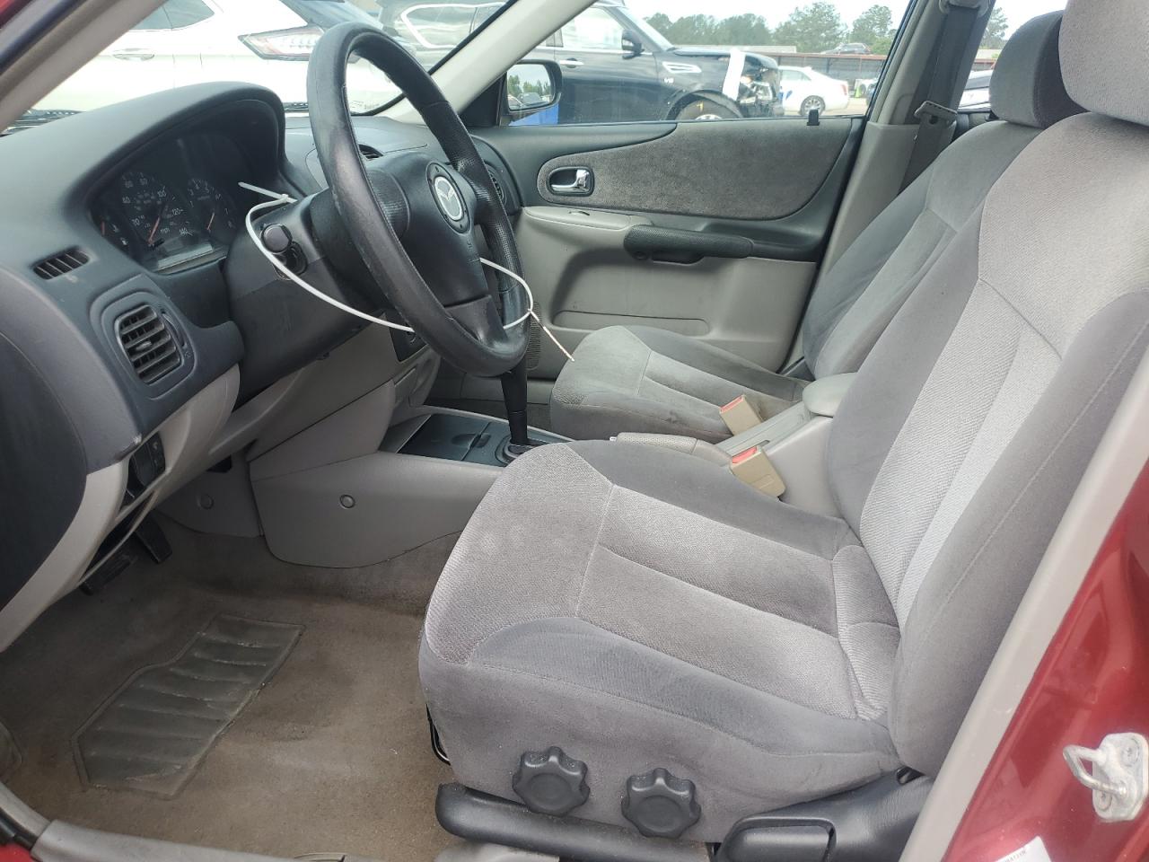 2002 Mazda Protege Dx VIN: JM1BJ225521564900 Lot: 56835065