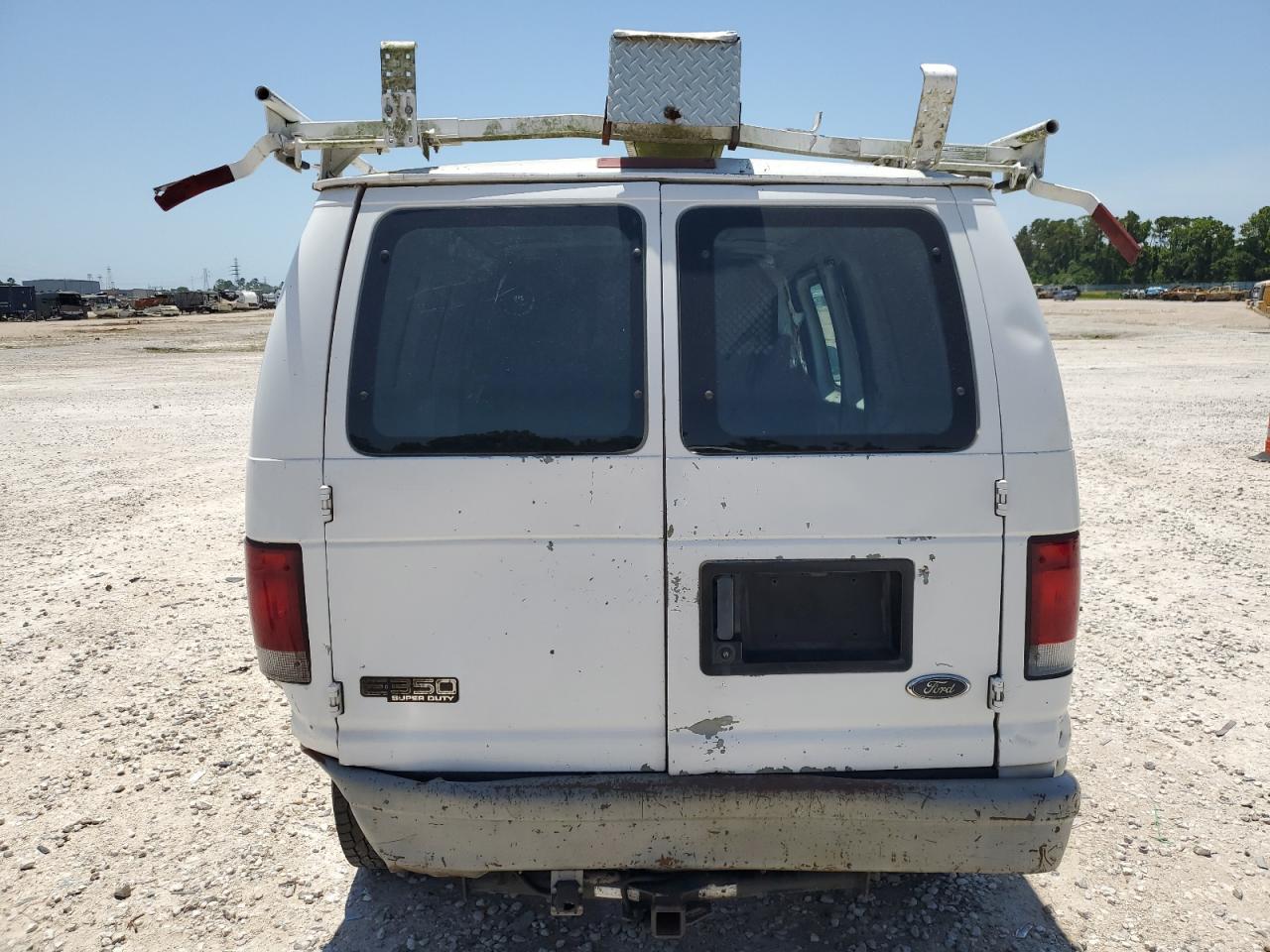 2000 Ford Econoline E350 Super Duty Van VIN: 1FTSE34F9YHA77831 Lot: 56850225