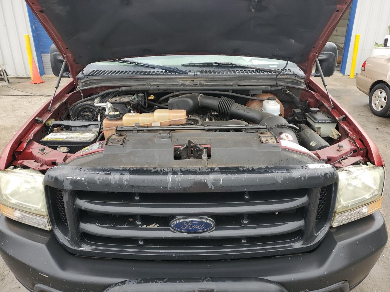 2002 Ford F250 Super Duty VIN: 1FTNX21LX2EA87031 Lot: 57559135