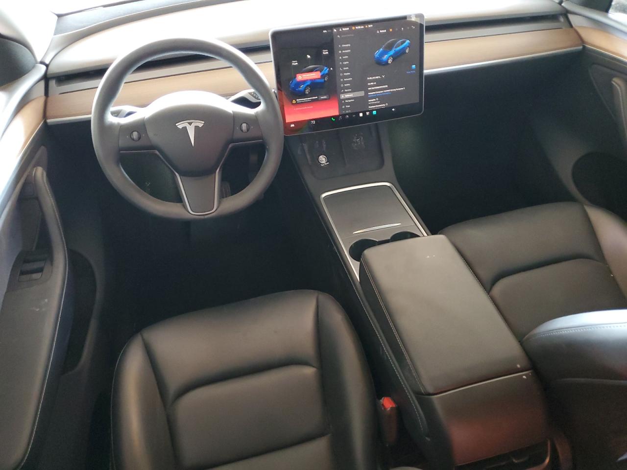 2023 Tesla Model Y VIN: 7SAYGDEEXPA113329 Lot: 56982025