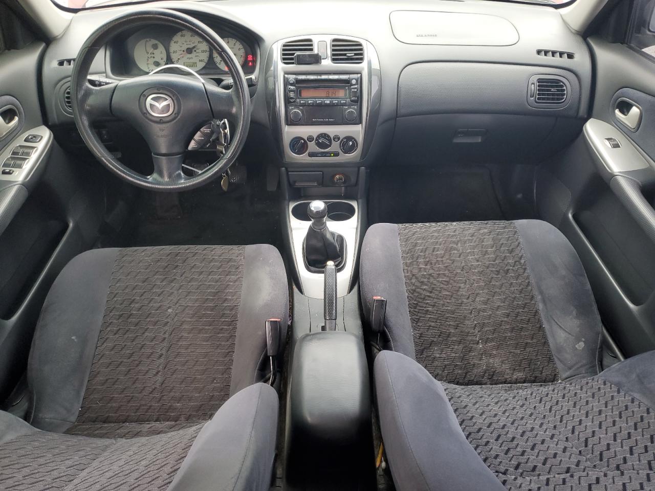 2002 Mazda Protege Dx VIN: JM1BJ225320636991 Lot: 57915265