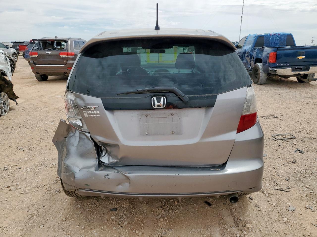2009 Honda Fit Sport VIN: JHMGE88449S017499 Lot: 56910585