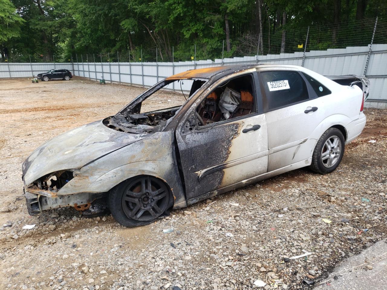 2002 Ford Focus Se للبيع في Austell، GA - Burn - Engine