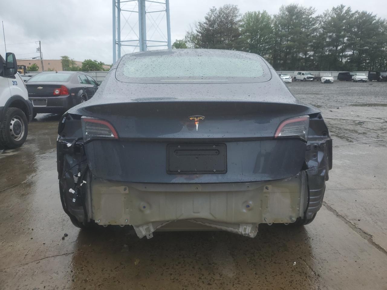 2023 Tesla Model 3 VIN: 5YJ3E1EA9PF699744 Lot: 56407215