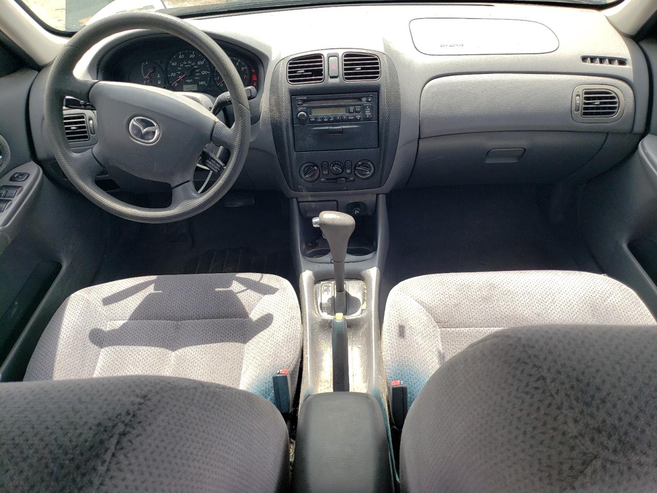 2000 Mazda Protege Dx VIN: JM1BJ2229Y0214674 Lot: 56354685