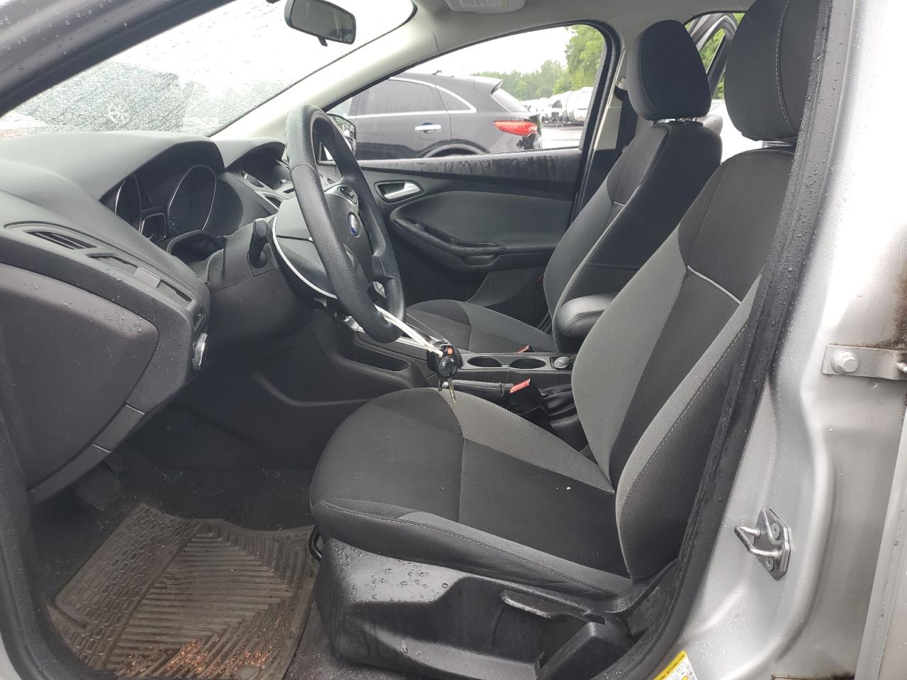 2014 Ford Focus Se VIN: 1FADP3F21EL435158 Lot: 56556055