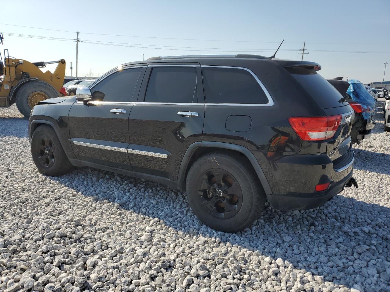 2011 Jeep Grand Cherokee - Image 2