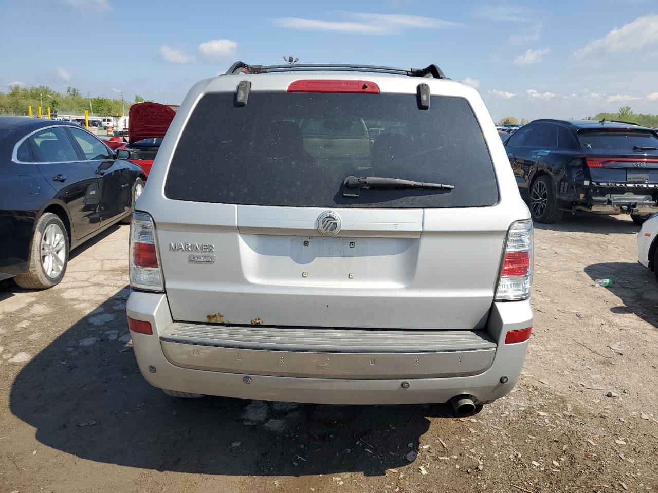 2009 Mercury Mariner Premier VIN: 4M2CU87769KJ11358 Lot: 55577235