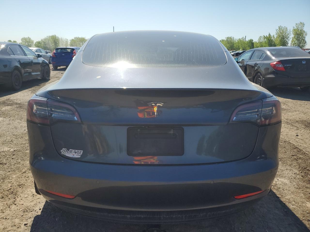 2020 Tesla Model 3 VIN: 5YJ3E1EA7LF718947 Lot: 57578625