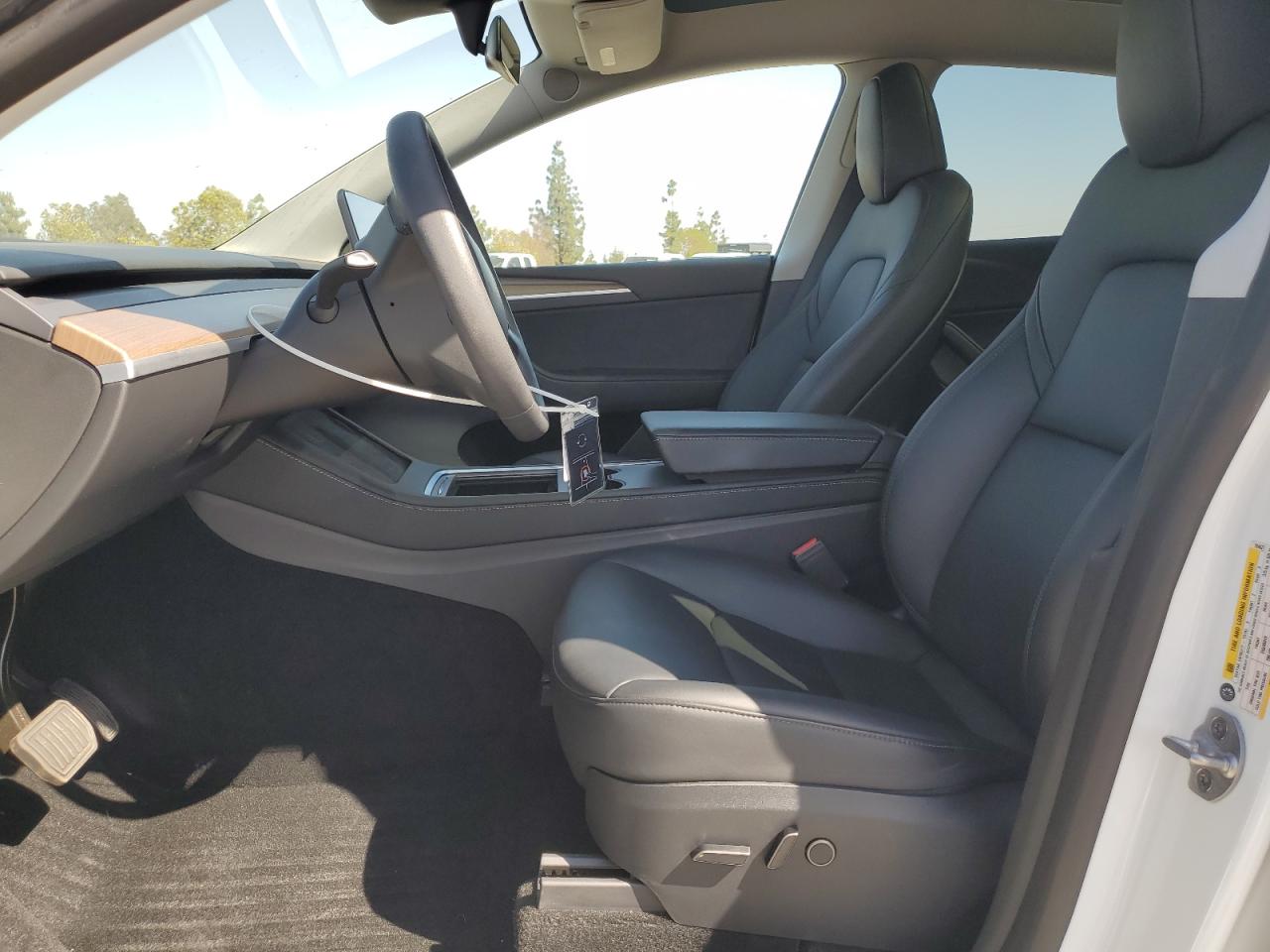 2023 Tesla Model Y VIN: 7SAYGDEE8PA094621 Lot: 56987365