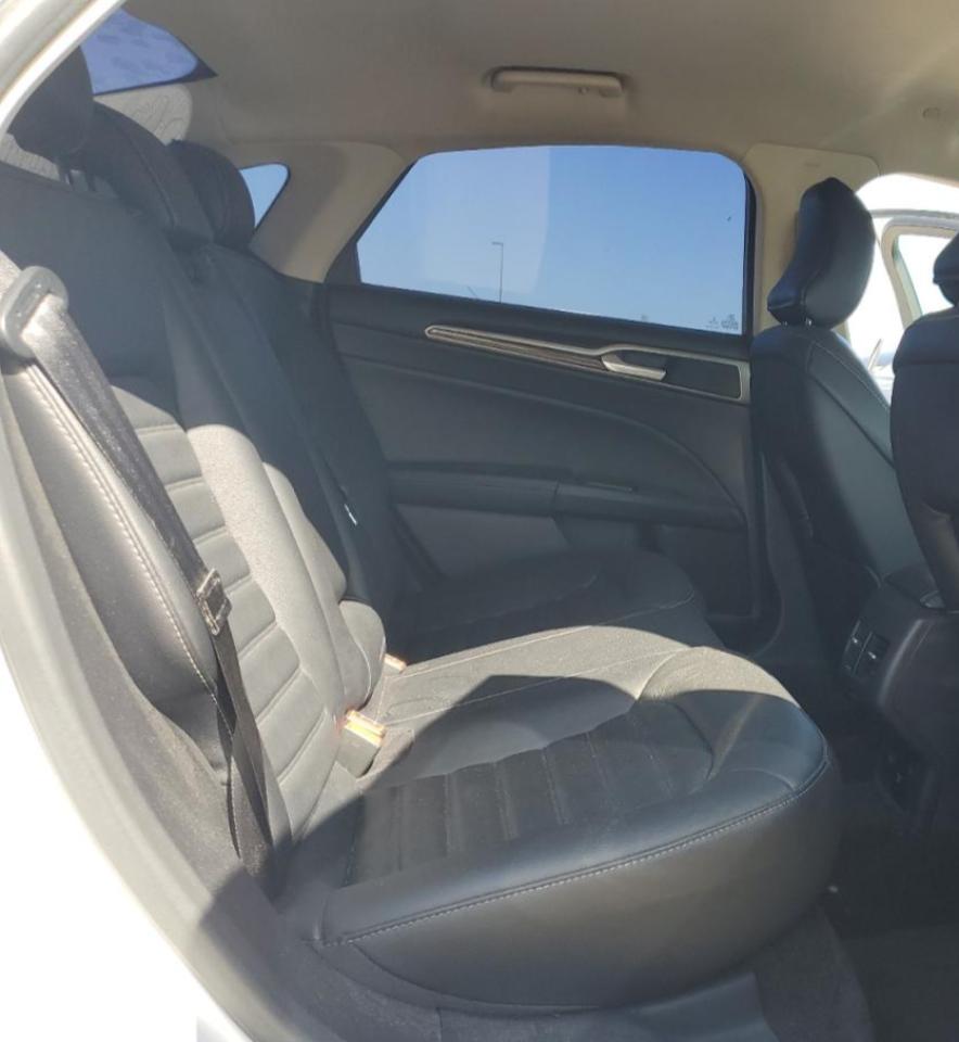 2017 Ford Fusion Se Hybrid VIN: 3FA6P0LU0HR409699 Lot: 56830645