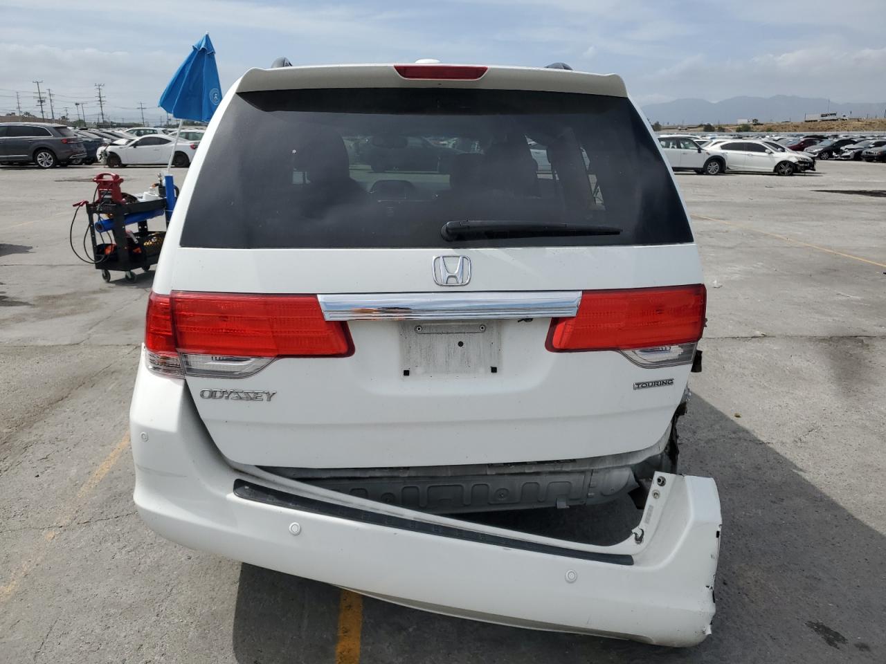2010 Honda Odyssey Touring VIN: 5FNRL3H94AB068484 Lot: 56819895