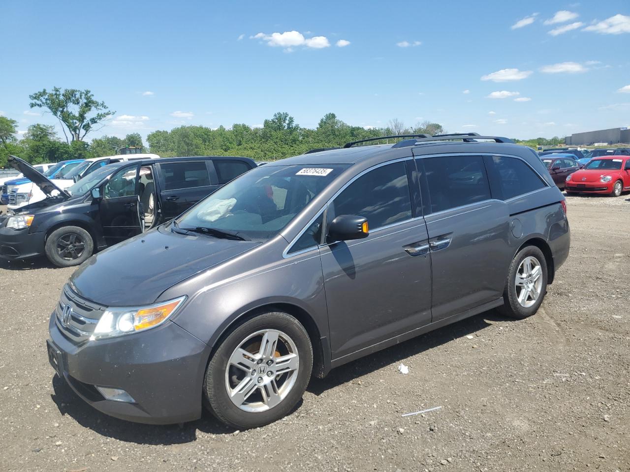 2012 Honda Odyssey Touring na sprzedaż w Des Moines, IA - Front End