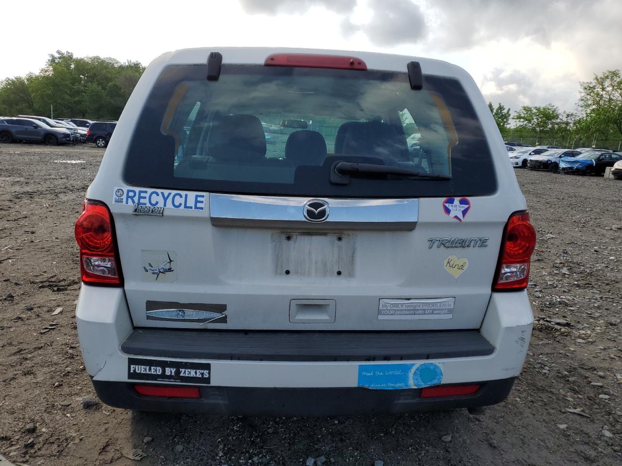 2011 Mazda Tribute I VIN: 4F2CY0C75BKM00092 Lot: 55659315