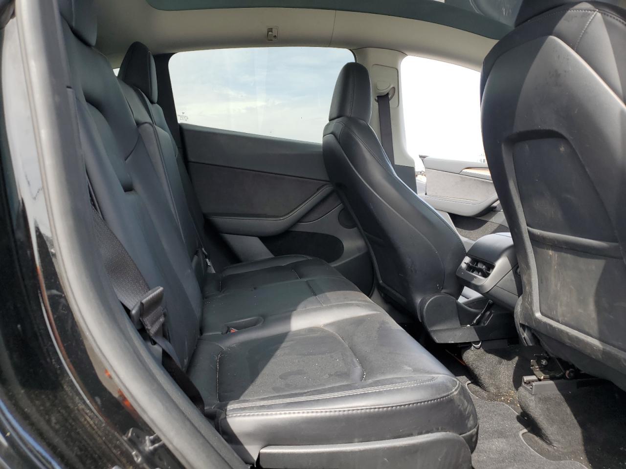 2023 Tesla Model Y VIN: 7SAYGAEE2PF825495 Lot: 57495415