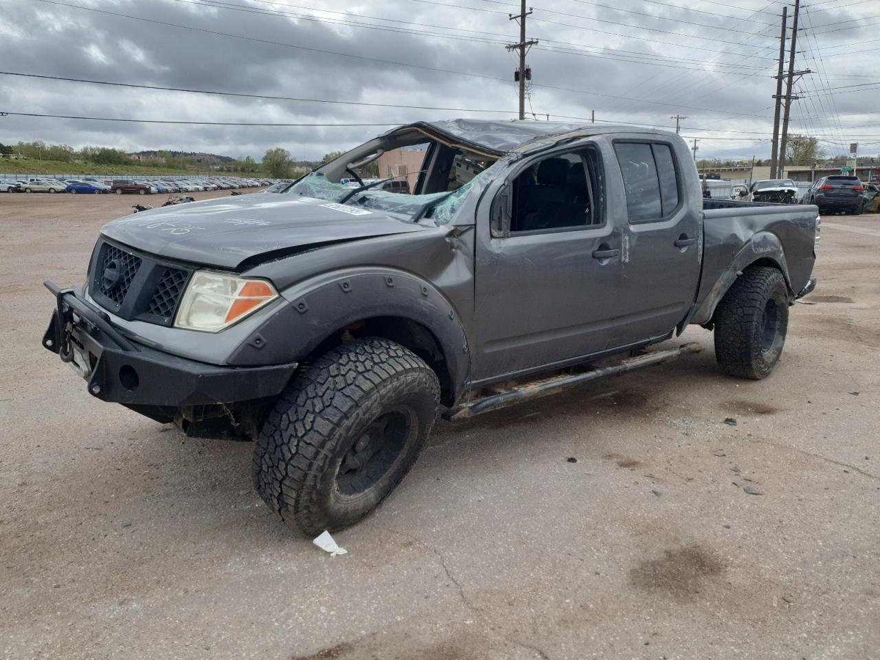 2008 Nissan Frontier Crew Cab Le for Sale in Colorado Springs, CO - Rollover