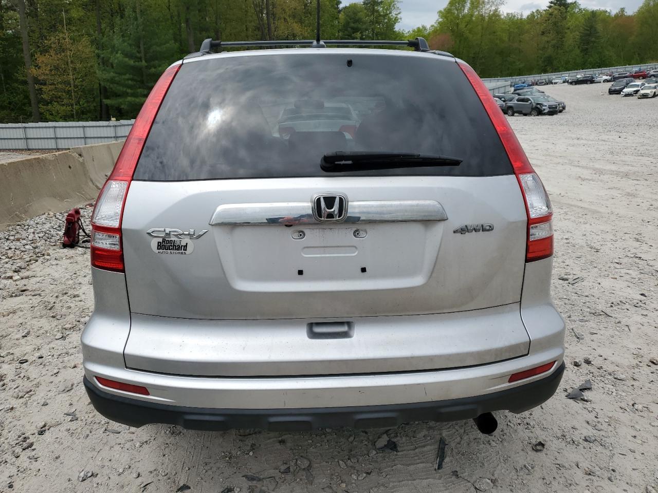 2010 Honda Cr-V Exl VIN: JHLRE4H7XAC004674 Lot: 56661425