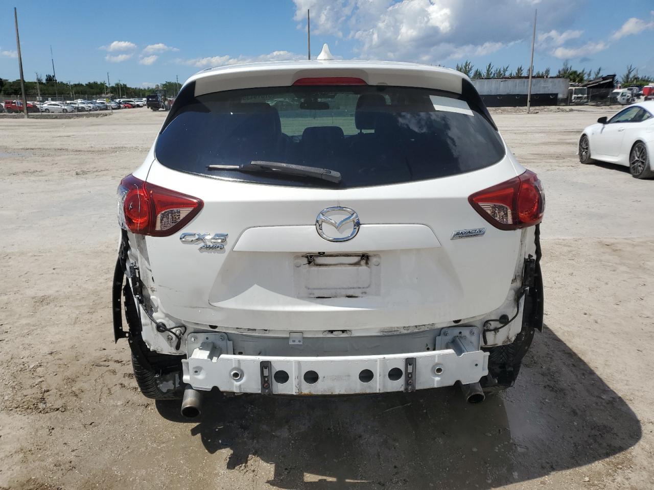 2014 Mazda Cx-5 Touring VIN: JM3KE4CY8E0334259 Lot: 57019435