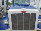 2009 Peterbilt 367 Roll-Off Container Truck იყიდება Bridgeton-ში, MO - Side