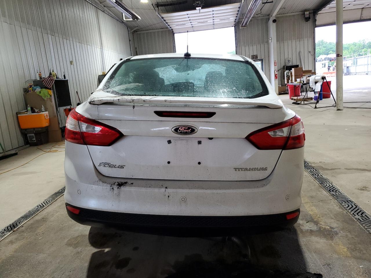 2014 Ford Focus Titanium VIN: 1FADP3J28EL240309 Lot: 56841415
