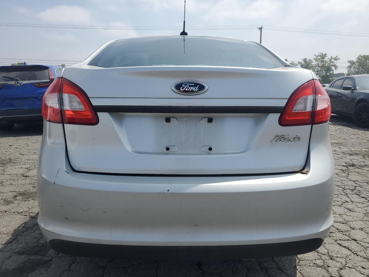 2012 Ford Fiesta S VIN: 3FADP4AJXCM129415 Lot: 55447135